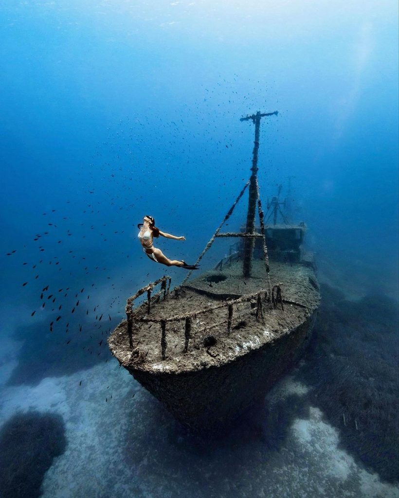 Certified scuba diver exploring underwater caves with Triton Adventures in Ayia Napa, Cyprus