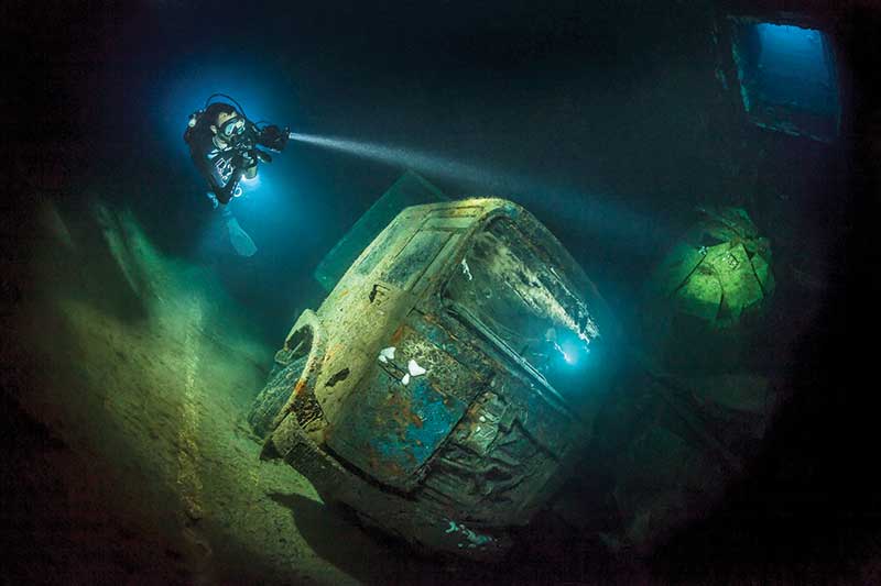 Certified scuba diver exploring underwater zenobia wreck with Triton Adventures in Ayia Napa, Cyprus